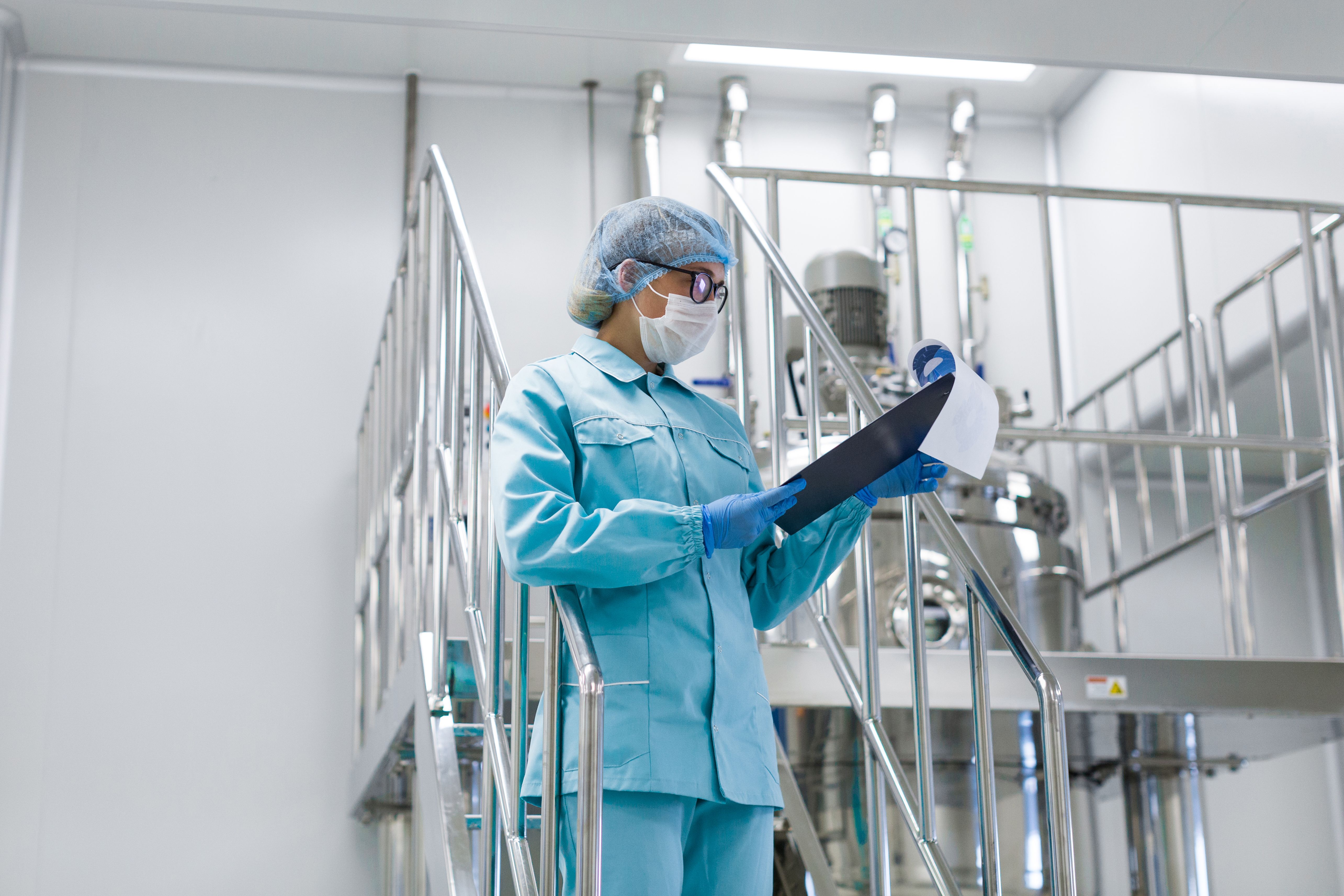 scientist-monitors-readings-equipment