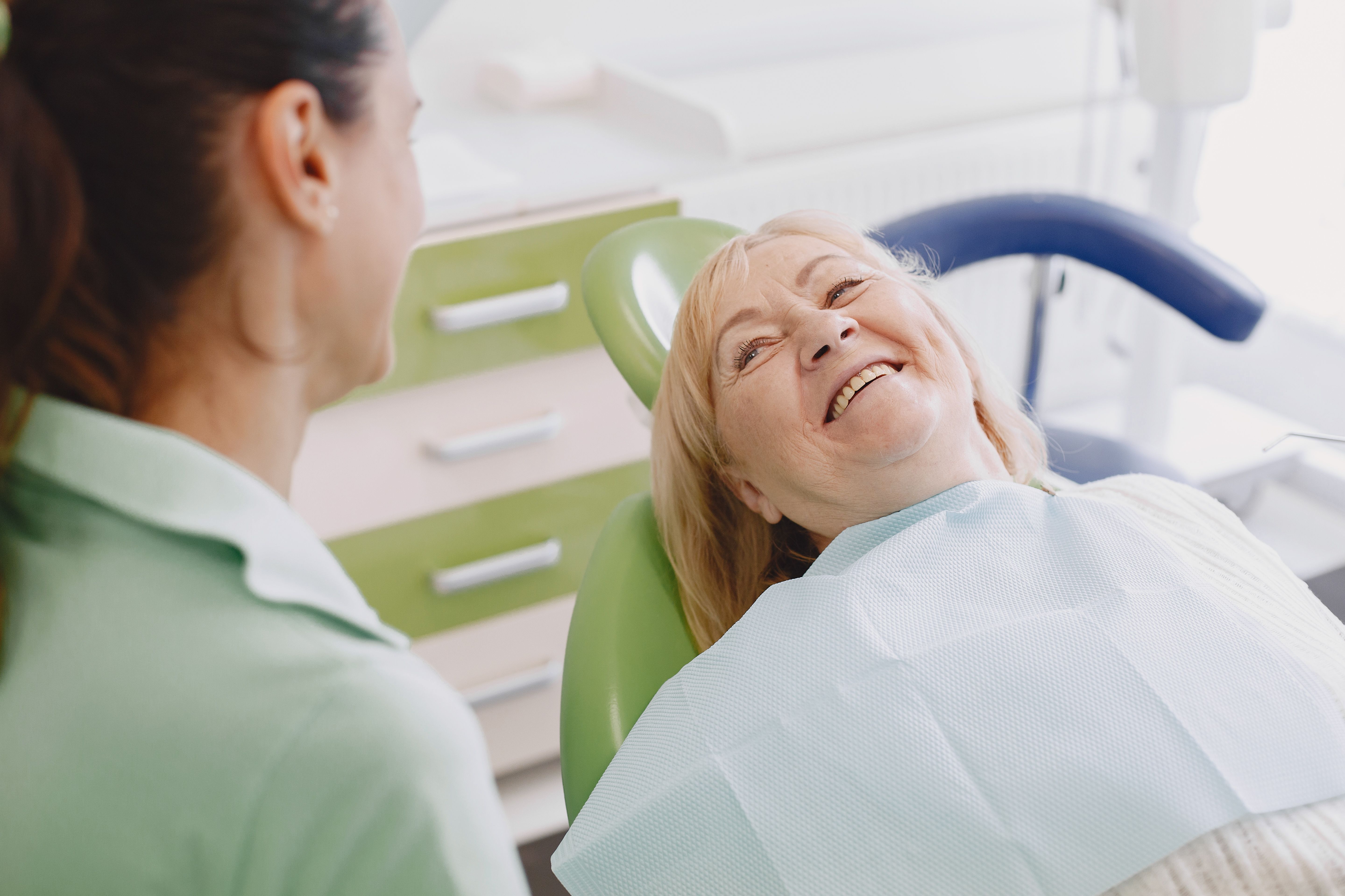 senior-woman-having-dental-treatment-dentist-s-office-woman-is-being-treated-teeth.jpg
